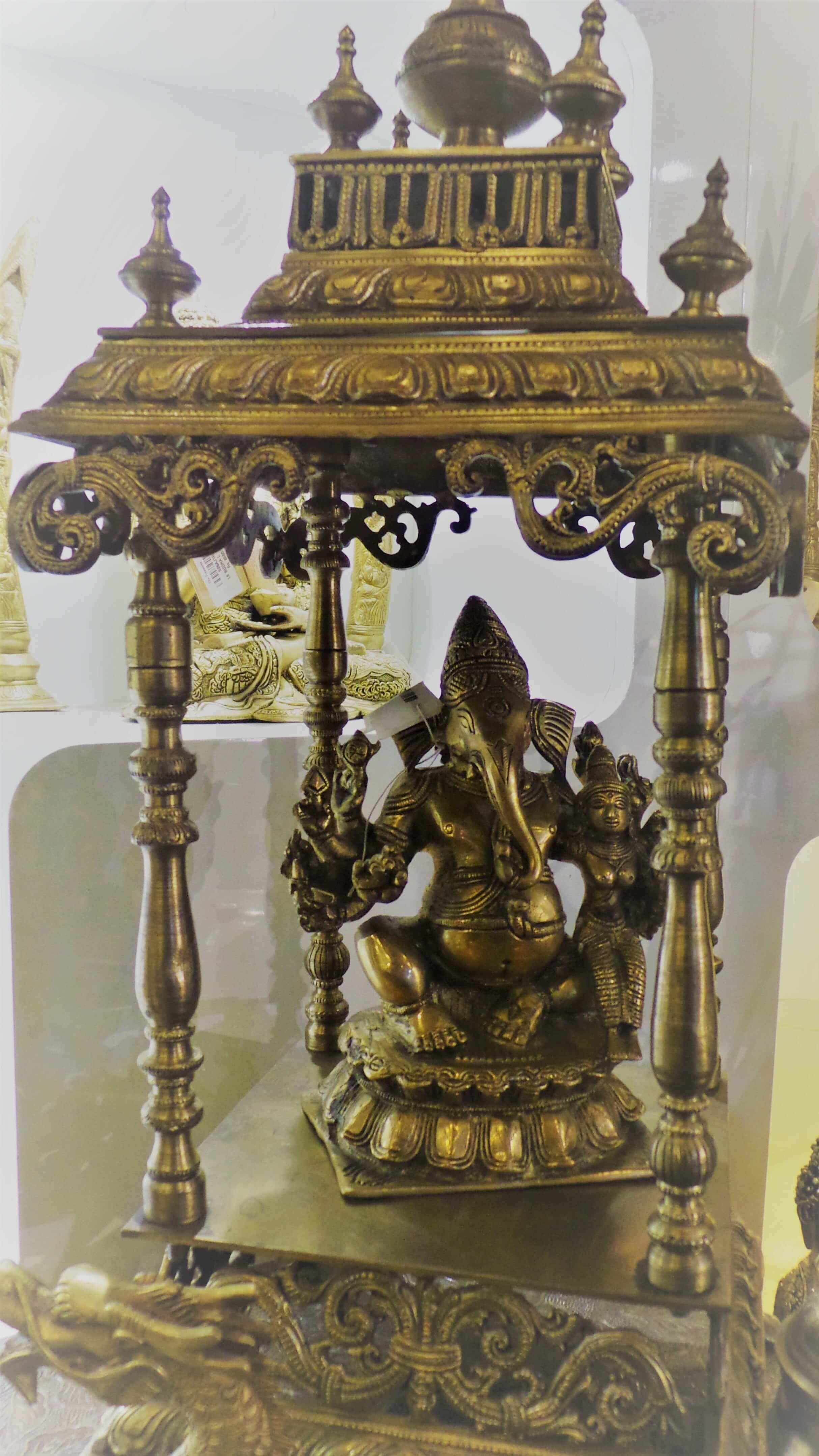 Ganesha in a brass Mandap