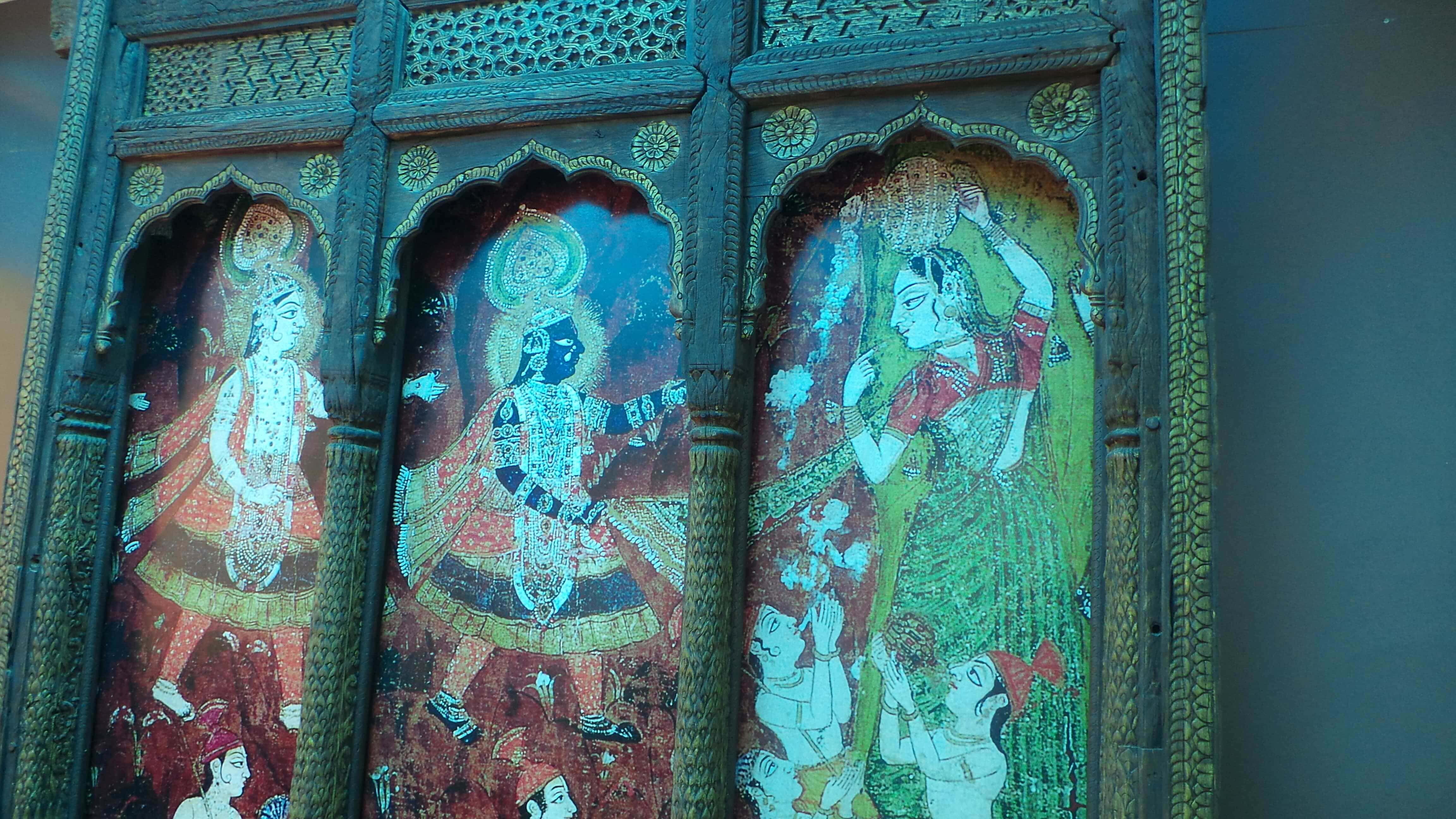 Paintings in the balcony dining area at Kesariya kesariya