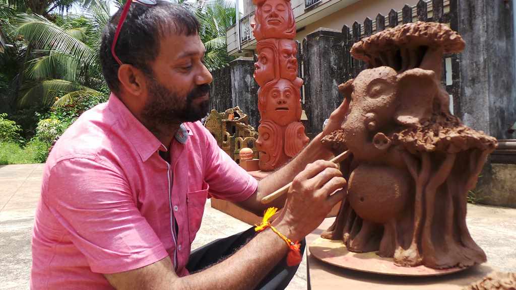 Vraksha Ganapathy by Venki palimar in terracotta