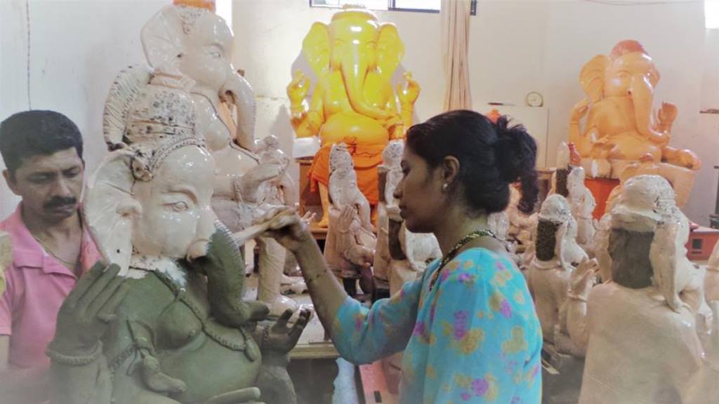 The initial stages of painting the Ganapathi Idols Ganapathi Idols in clay at mangalore. Mahesh Rao and wife Seema work in harmony