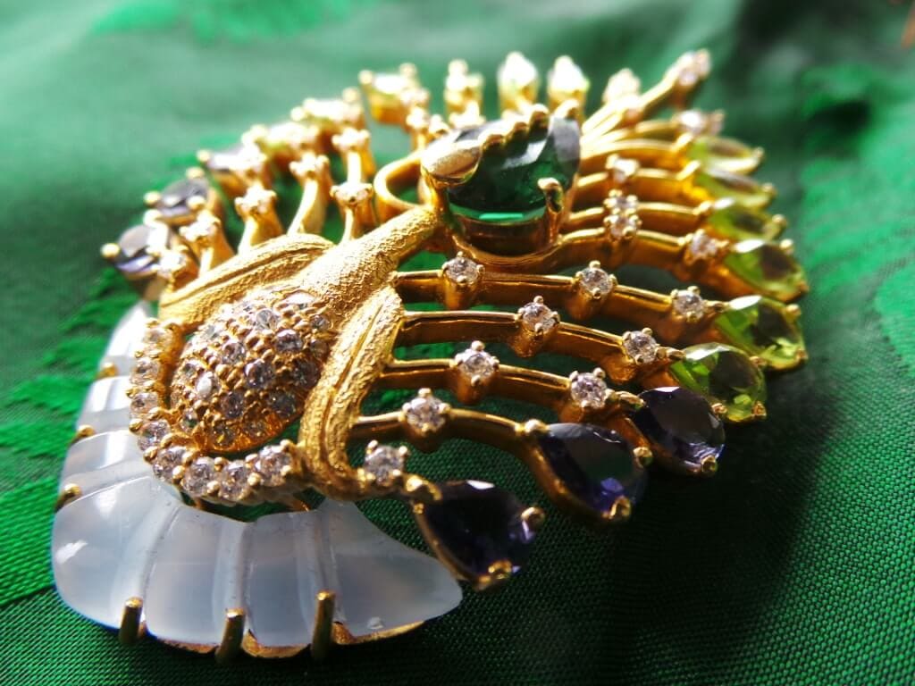 The peacock in precious stones Swarna Jewellers
