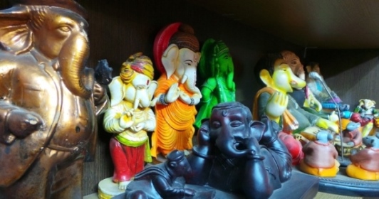 In fibre and colourful Ganapathi sculptures and paintings