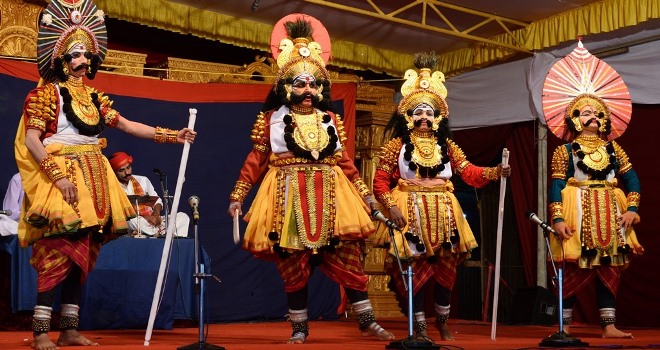 The Himmela in the background with the narrator called the Bhagavatha Yakshagana Performance- Thenku Thittu