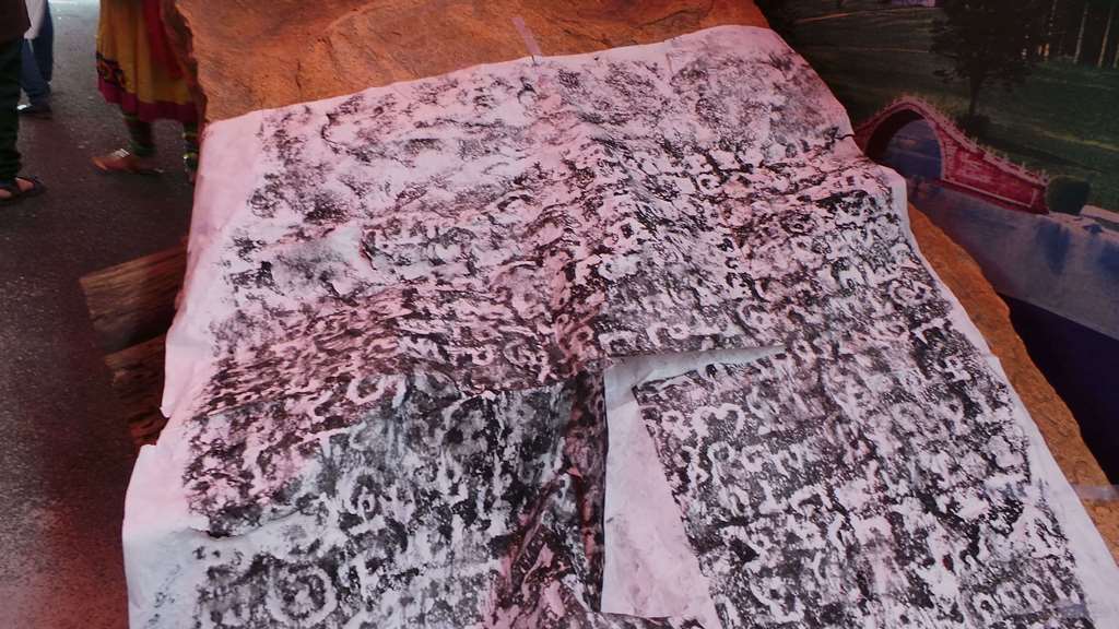 The demonstration of deciphering the script Inscription Stones Of Bangalore