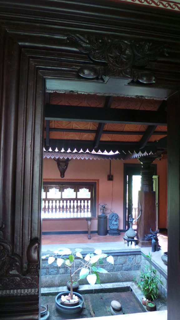Mangalore tiles and rafters with open courtyard Mangalore tiles and rafters with open courtyard