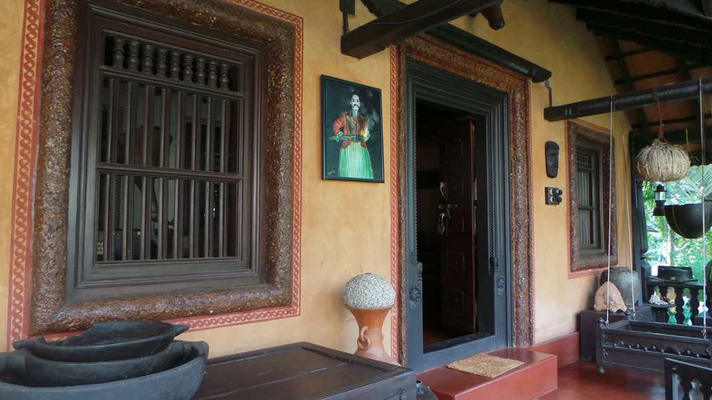 The entrance to the Heritage home Mayagundi The organic texture of the walls